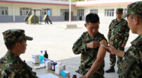 US military requires flu vaccine for some after outbreak in Texas training center